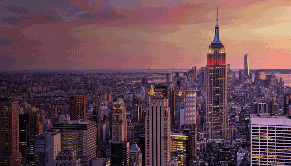 Aerial view of New York City midtown with Empire State Building at sunset