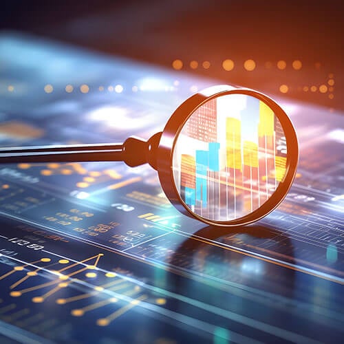 tmf accounting and tax image magnifying glass on desk with charts